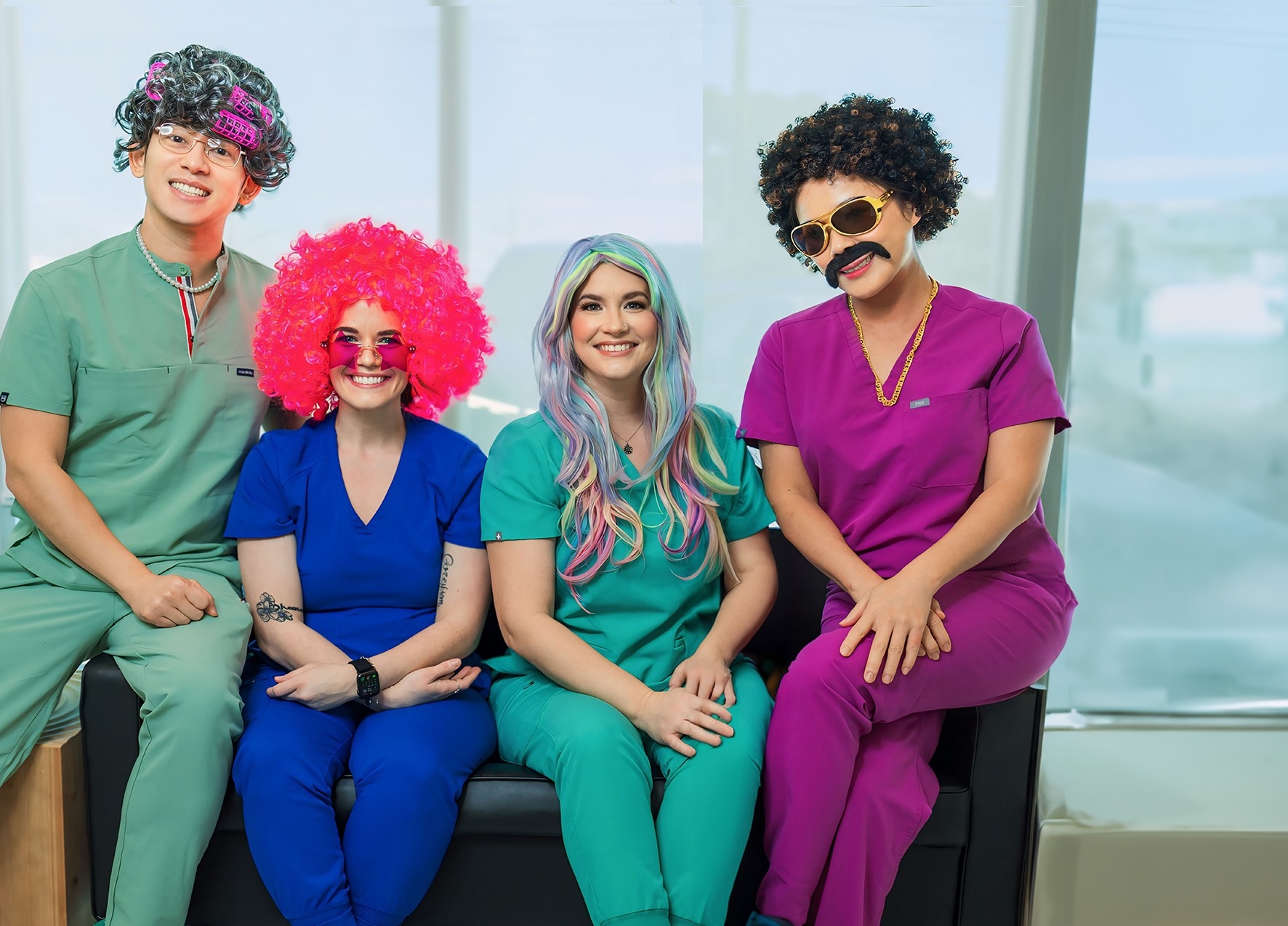 Bloom Pediatric Dentistry team wearing silly glasses and wigs