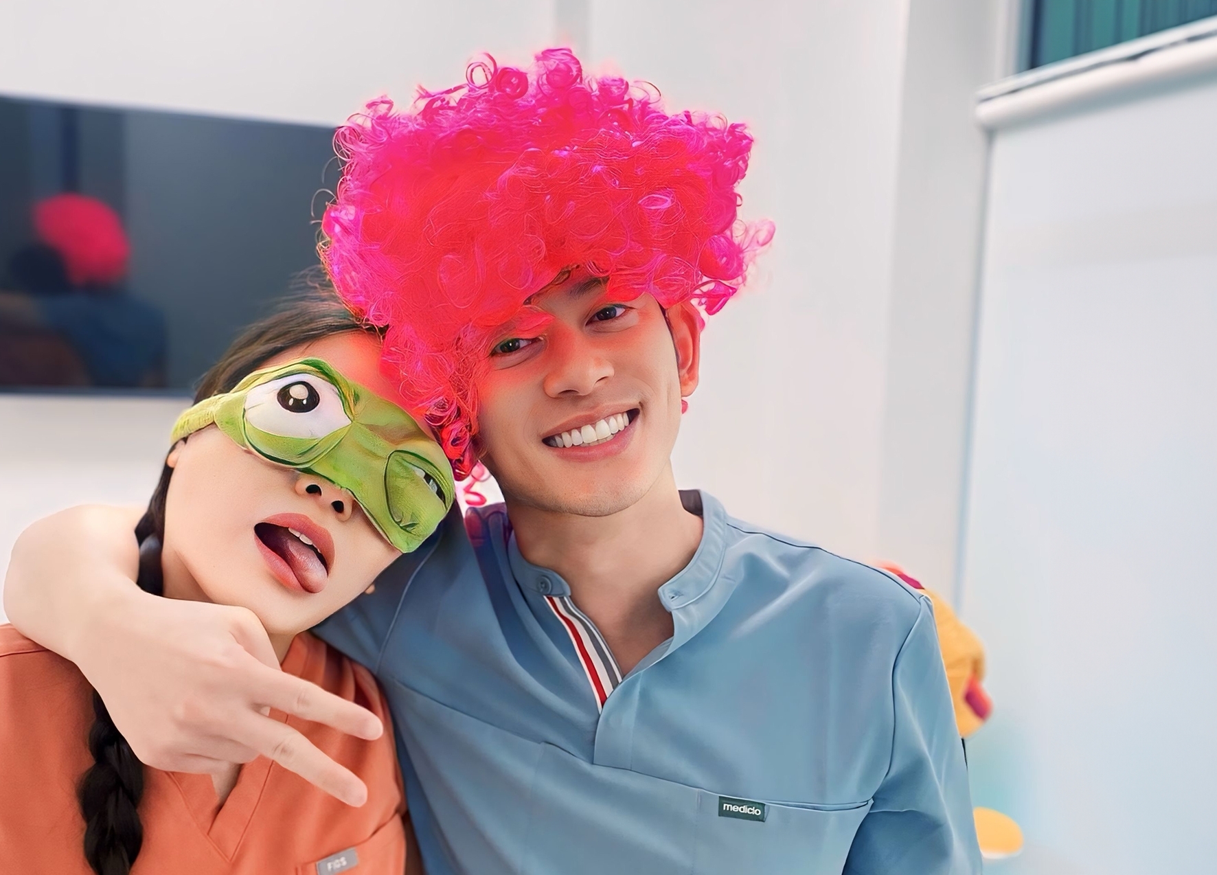 Murphy childrens dentists wearing silly wigs and masks