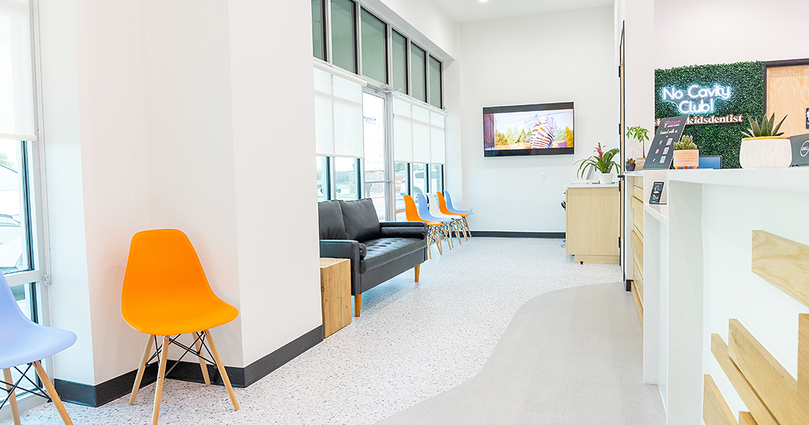 Chairs and couch in reception area